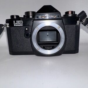 Chinon LED Promaster 35mm SLR Film Camera with Two Lenses and A Flash Untested